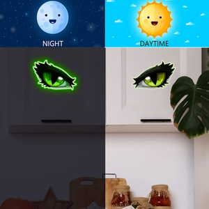 Adesivi murali luminosi occhi di gatto con effetto fluorescente verde al buio