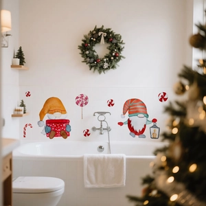 Christmas gnomes and candy wall stickers applied on white bathroom tiles for holiday decor