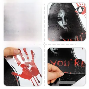 Detail of waterproof Halloween window stickers featuring bloody handprints and ghosts