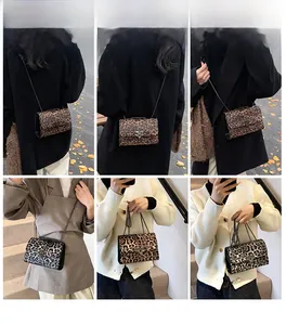 Detailed views of leopard print crossbody bag with metal chain strap and rivet trim