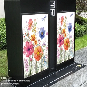 Creative floral and butterfly stickers showing collage effect on a black outdoor trash bin