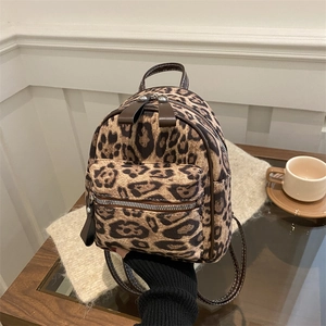Mini Sac à Dos Imprimé Léopard Mode pour Femmes Cuir PU Vintage Sac Bandoulière Seau Sac à Main Zippé pour École et Voyage