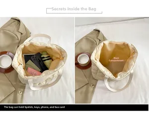 Detailed view of spacious interior of the quilted tote bag with daily essentials inside