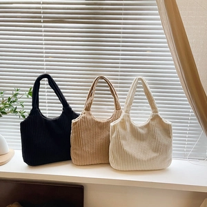 Corduroy tote bags in black, khaki, and cream colors for daily casual and work use