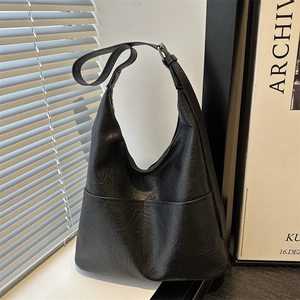 Stylish simple black leather hobo shoulder bag for women large capacity winter commuter bag