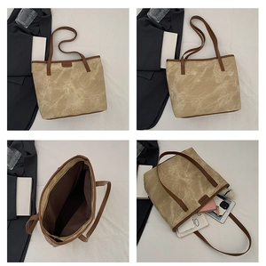 Macro detail of spacious tote bag with marble print and internal storage capacity