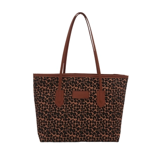 Chic leopard print tote bag with brown straps and large capacity for daily use