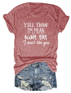 Detail of distressed denim shorts with fringe and casual graphic t-shirt set