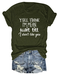 Army green t-shirt with funny text print paired with frayed denim shorts for a casual look