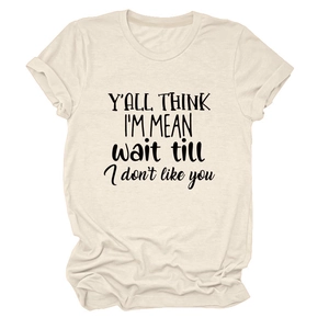 Detail of Y'all Think I'm Mean text on beige cotton blend crewneck short sleeve t-shirt