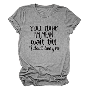 Detail of the humor quote print on a dark gray crewneck short sleeve cotton t-shirt