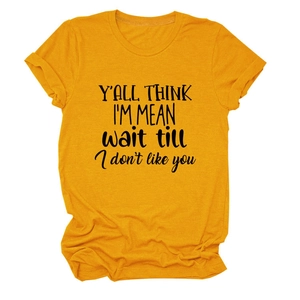 Detail of a ginger yellow crewneck T-shirt with black sarcastic slogan typography