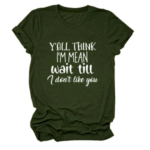 Close-up of Y'all Think I'm Mean slogan print on dark green cotton T-shirt