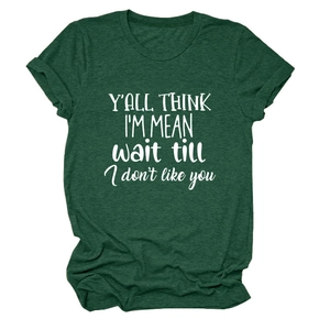Close-up of forest green cotton t-shirt with white y'all think i'm mean slogan