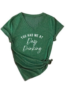 Detail of heather dark green V-neck T-shirt with 'YOU HAD ME AT Day Drinking' white print