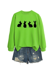 Neon green oversized sweatshirt with rabbit silhouettes and distressed denim shorts set