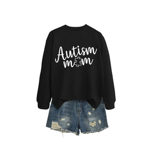 Black Autism Mom puzzle sweatshirt with denim shorts on a clean white background