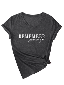 Detail of dark gray V-neck tee with white 'REMEMBER your why' text and front knot design