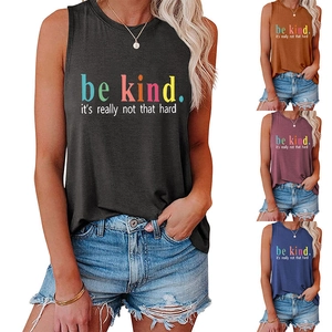 Detail of the colorful 'be kind' slogan printed on soft cotton blend tank tops for women