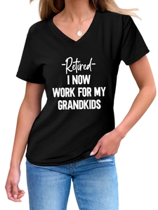 Close-up of black V-neck t-shirt with Retired I Now Work For My Grandkids text print