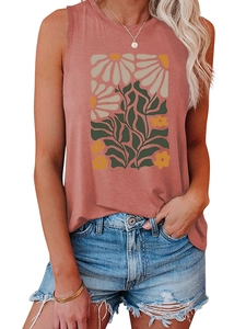 Detail of rust red tank top featuring vintage yellow floral print and crew neck