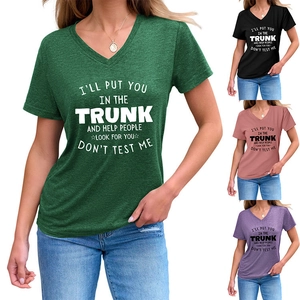 Detail showing V-neckline and slogan print on soft cotton t-shirts in various colors