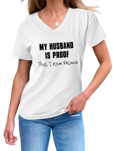 Close-up of V-neck white T-shirt with My Husband Is Proof black slogan print