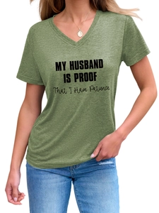Detail of green V-neck T-shirt with My Husband Is Proof printed slogan and soft cotton texture