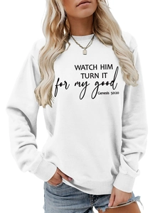Close-up of white crewneck sweatshirt with Genesis 50:20 text and ribbed cuffs