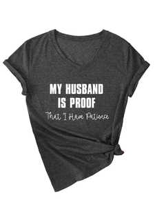 Detail of grey V-neck T-shirt with MY HUSBAND IS PROOF white slogan print