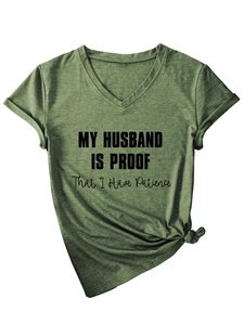 Detail of V-neck T-shirt in dark green with slogan print and side knot detail