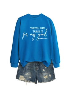 Detail of royal blue crewneck sweatshirt with white Genesis 50:20 bible verse print