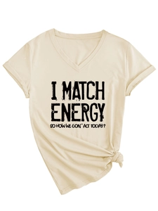 Detail of V-neck beige T-shirt featuring 'I MATCH ENERGY' print and side knot design