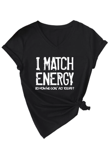 Detail of V-neck black T-shirt featuring I Match Energy slogan and stylish side knot design