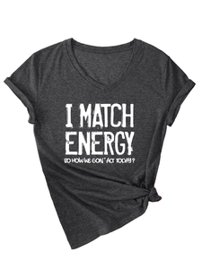 Detail of V-neck grey slogan T-shirt with rolled sleeves and knotted hem detail