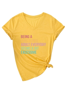 Detail of yellow V-neck T-shirt with rolled sleeves and a knotted hem design