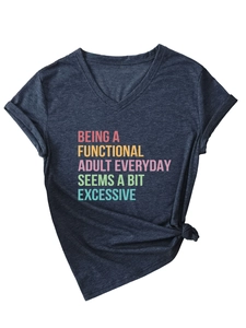 Detail of V-neck T-shirt showing colorful Being A Functional Adult slogan and side knot
