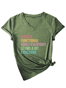 Detail of green V-neck T-shirt showing knit texture and motivational print with knot hem