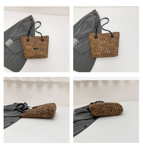 Detailed views of leopard print tote bag with black straps and minimalist leather patch