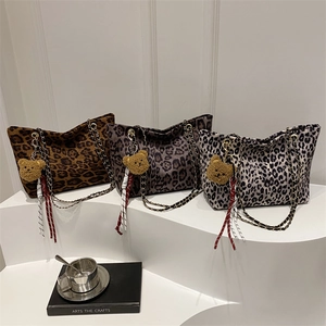 Leopard print faux fur tote bags in three colors with chain straps and bear charms