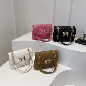 Quilted flap shoulder bags in four colors with gold bow buckles and chain straps