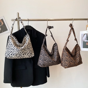 Fashionable leopard print canvas tote bags with decorative knot straps in three patterns