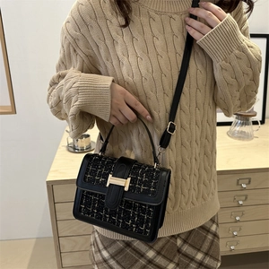 Minimalist black tweed small square bag with golden H buckle and adjustable shoulder strap