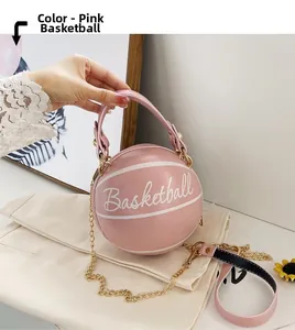 Detailed macro view of pink leather basketball bag with gold chain and white lettering