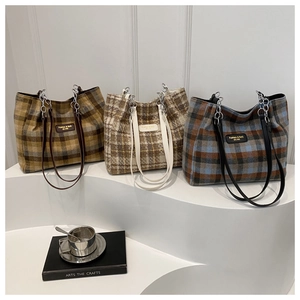 Large plaid wool tote bag for women featuring a chain strap and minimalist commute style