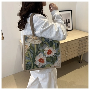 Detailed 3D oil painting floral pattern on artistic linen tote bag with woven handles