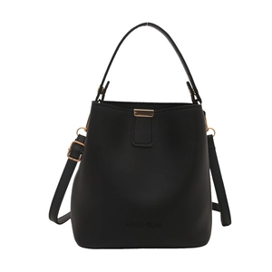 Modern black bucket bag with gold hardware and fashion lettering, handheld or crossbody