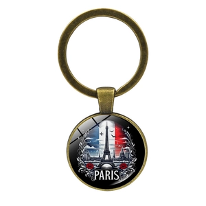 Llavero de recuerdo de París vintage en bronce con Torre Eiffel y bandera de Francia