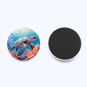 Round crystal glass sea turtle fridge magnet showing sea world illustration and magnetic back