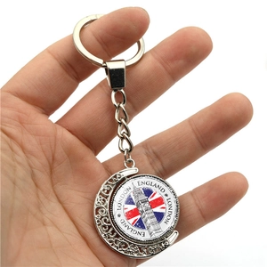 Silver London souvenir keychain with rotating Big Ben dial and British flag pattern